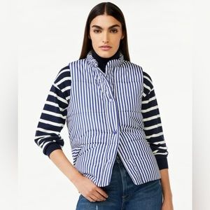 Adorable blue and white striped vest with snap closure and pocket detail.
